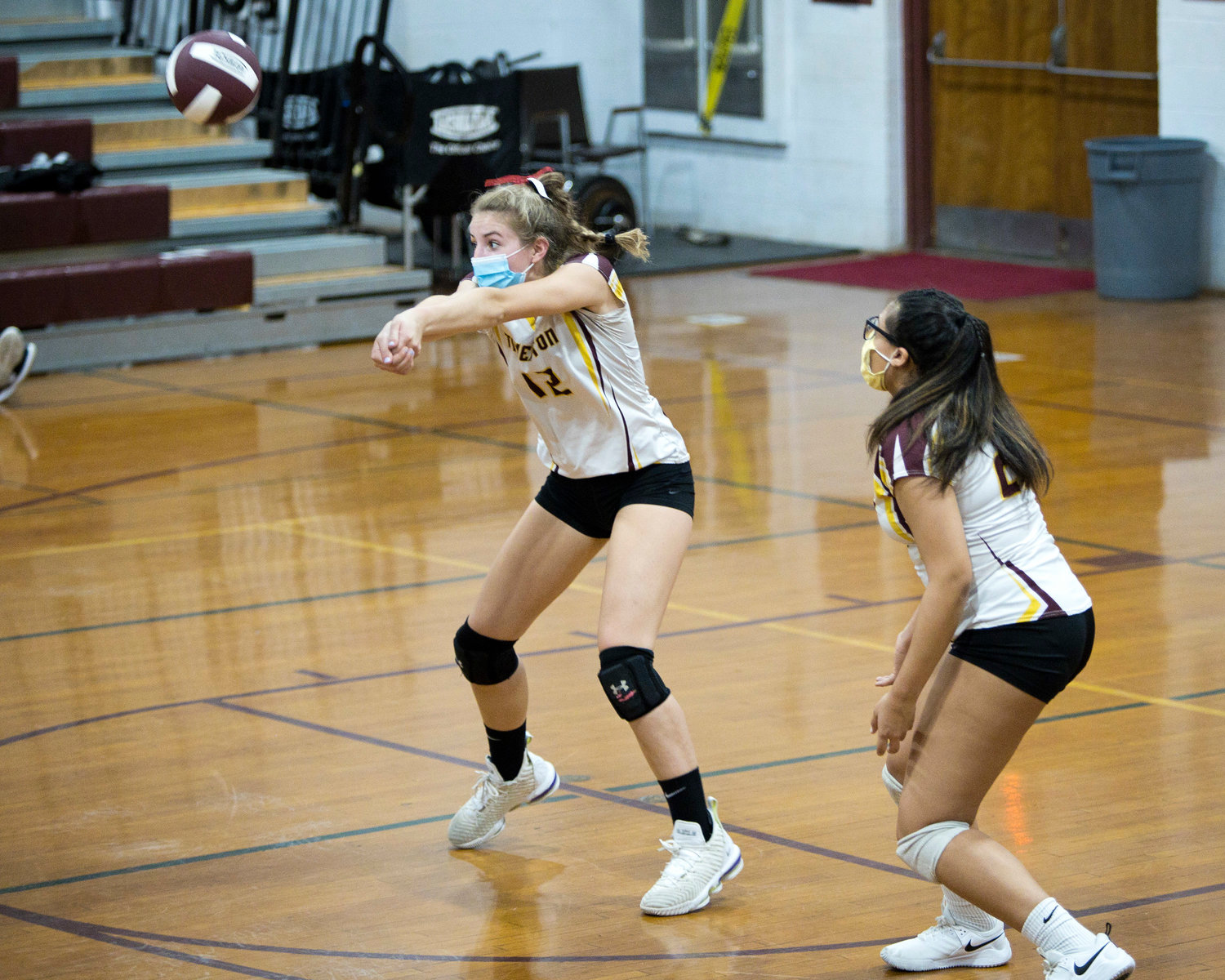 Molly Richardson receives a serve from Times Two Academy, Friday night.