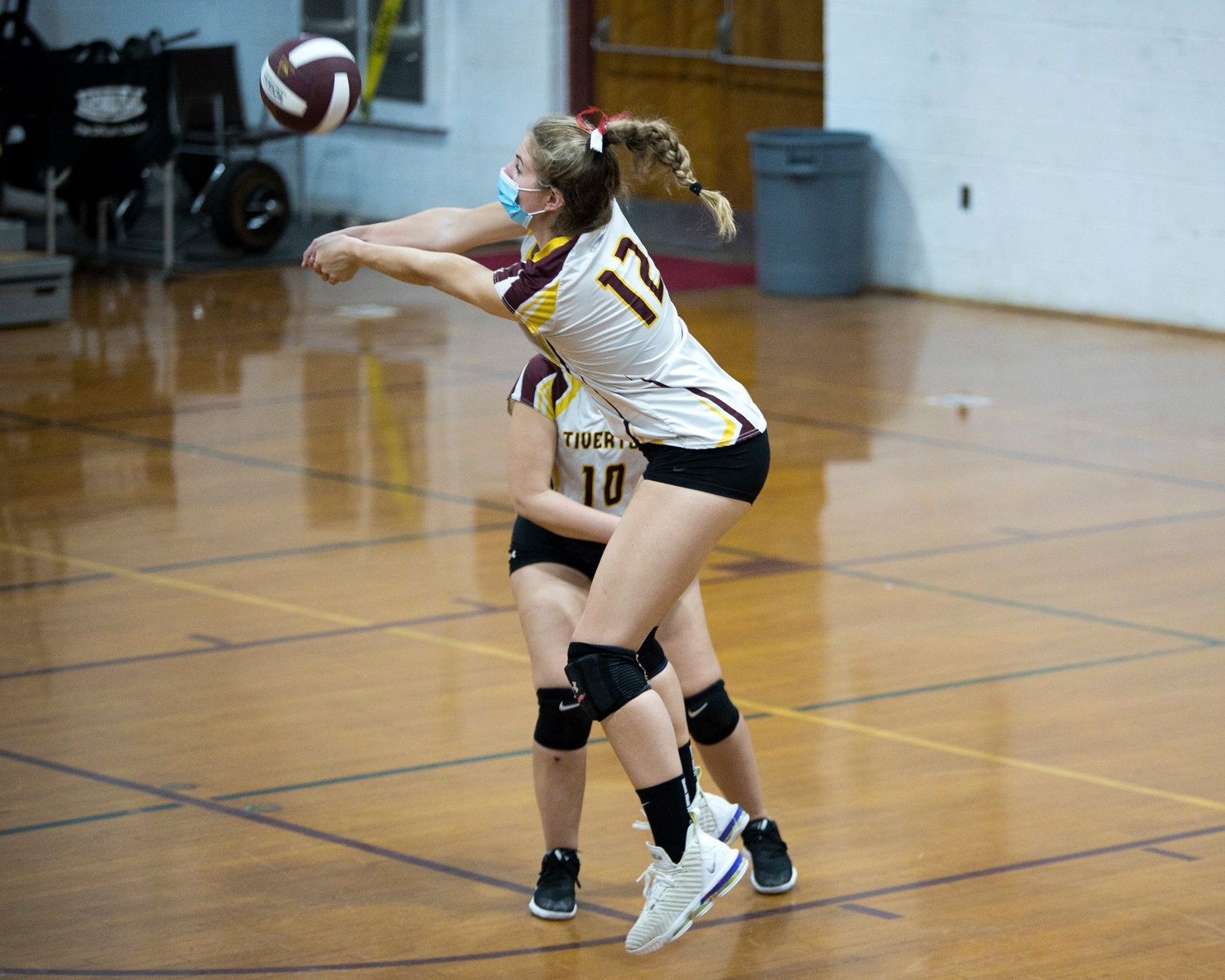 Molly Richardson sends the ball back over the net during Friday night's game against Times Two Academy.