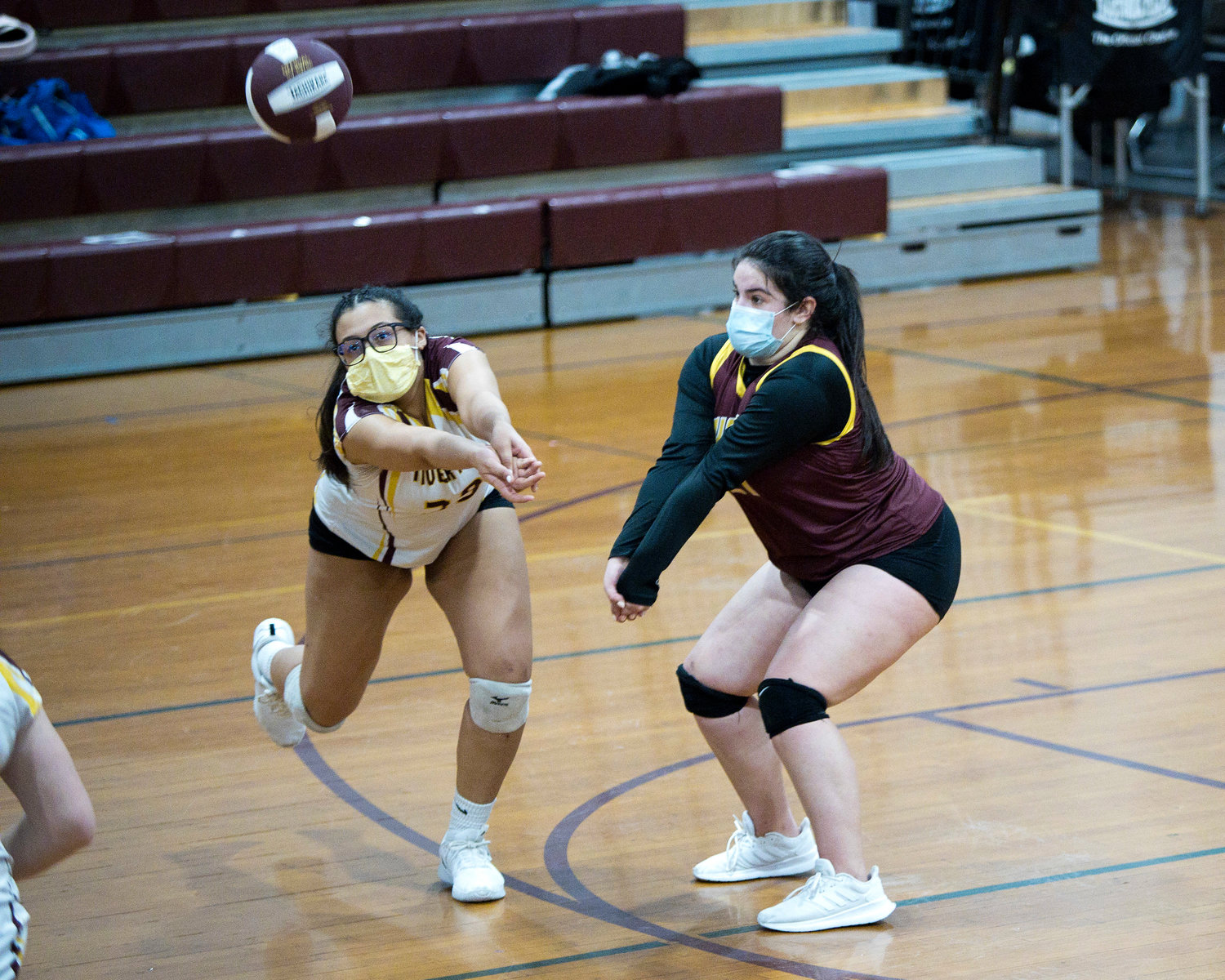 Olivia Miranda (left) and Olivia DeMacedo go for the ball during Friday night's game against Times Two Academy.