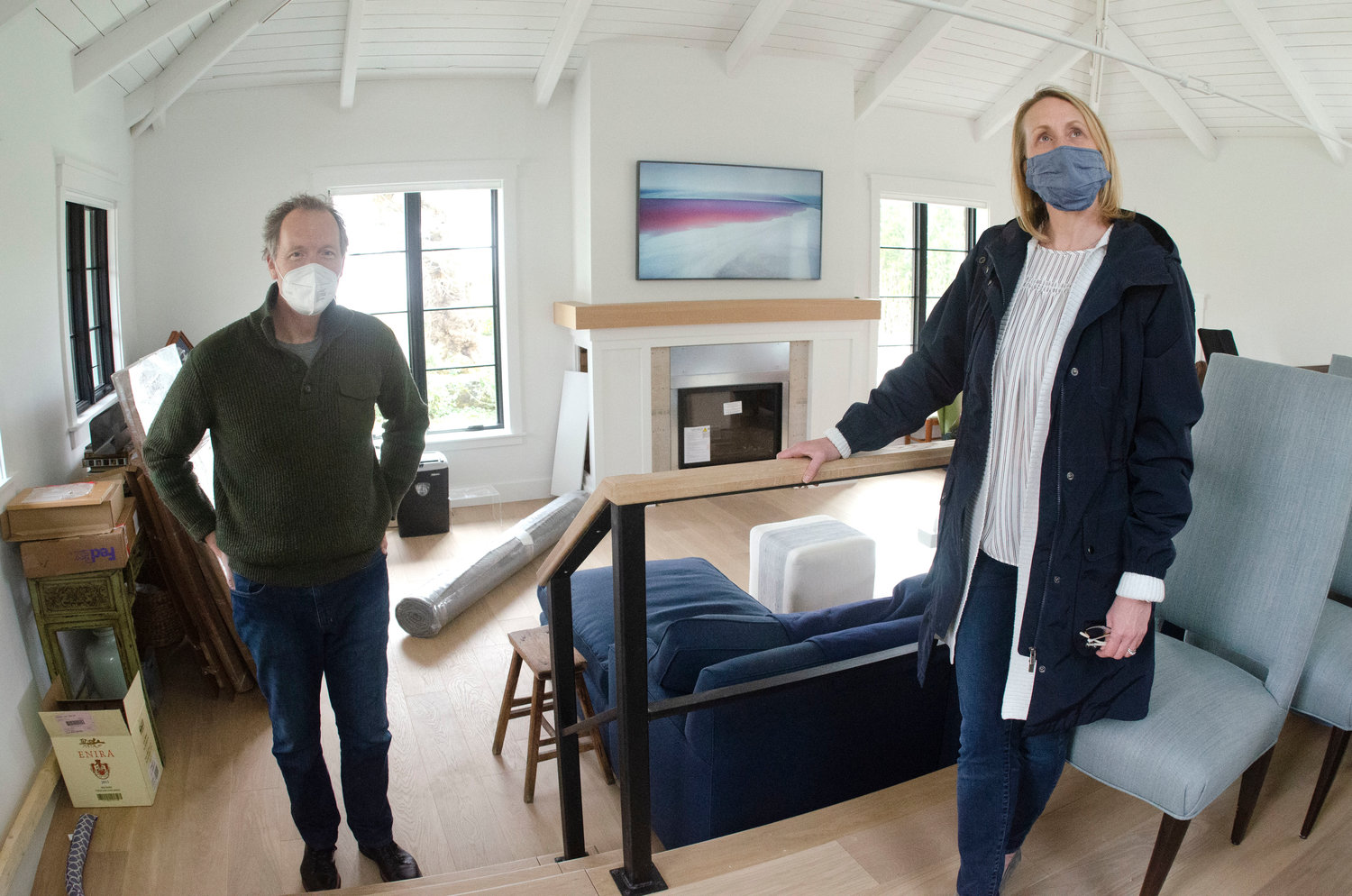 The Iseleibs are doing a major renovation of their new home, with the help of architect Cory Kallfelz (right).