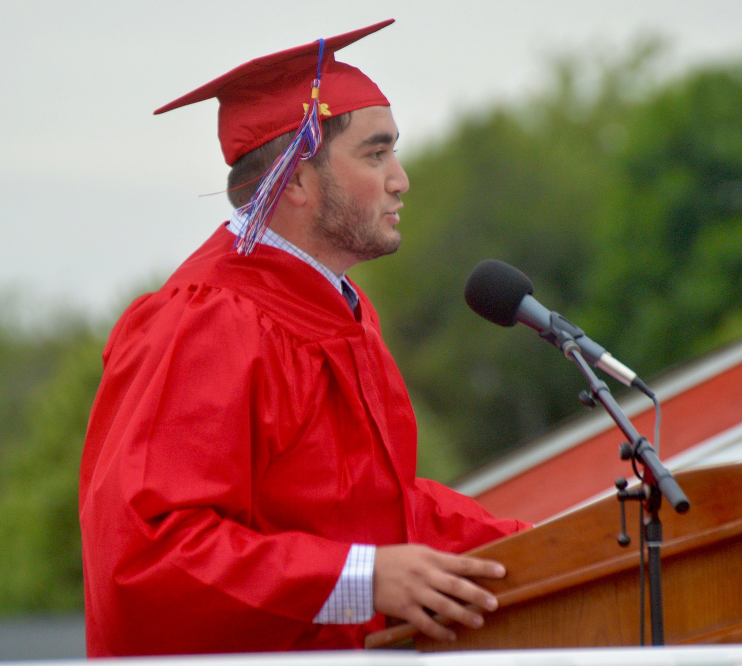 Mike Nardolillo addresses his fellow graduates during the "Spirit Speech."
