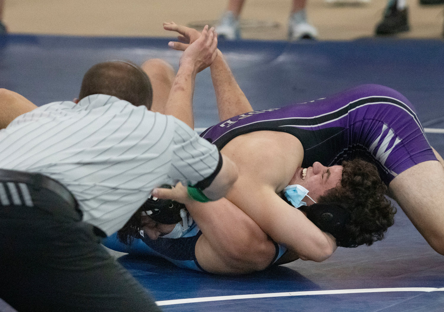 Nick Gomes pins an opponent during the tournament.
