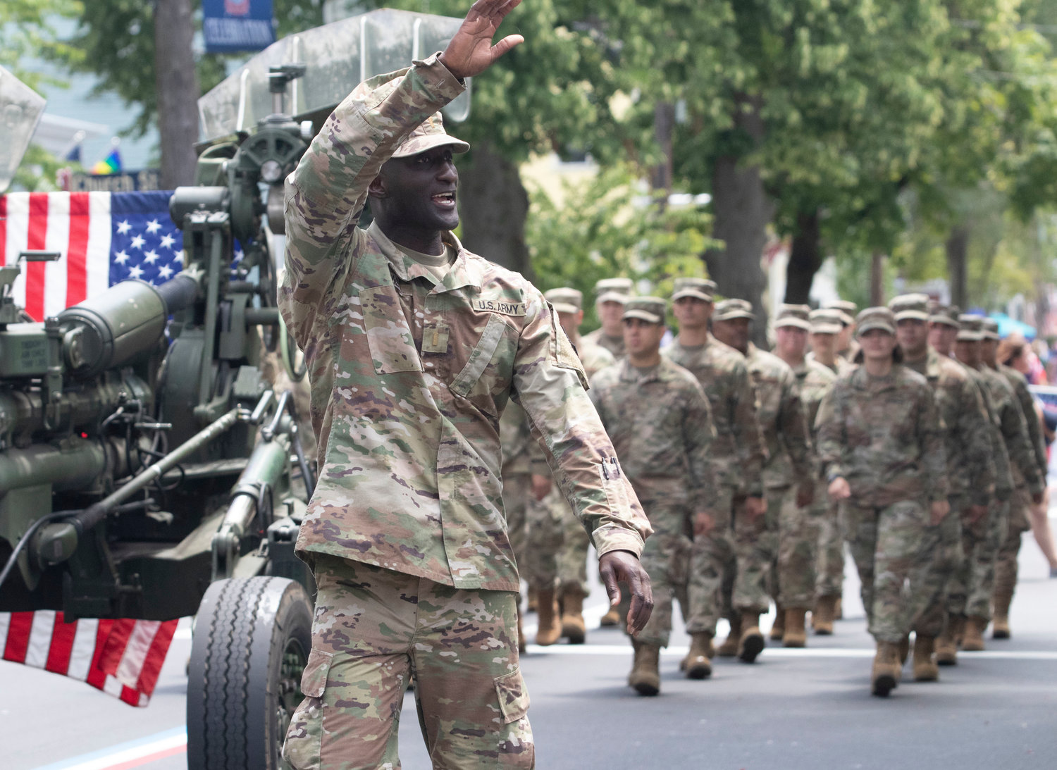 A unit of the U.S. Army marches the route.