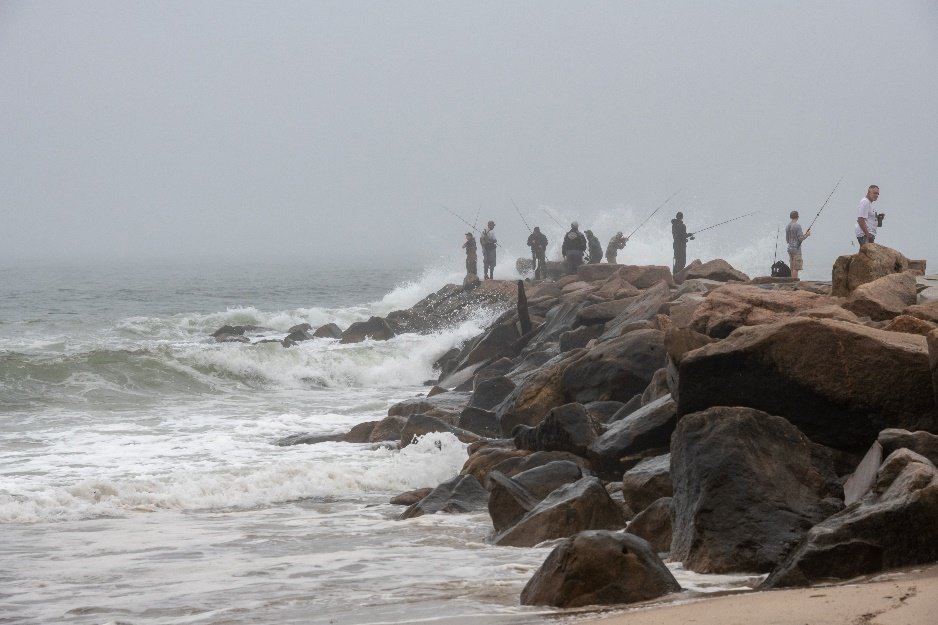 DEM urges saltwater anglers not to get too close to areas where waves are breaking. Slippery rocks are hazardous and even lethal during tropical storms.