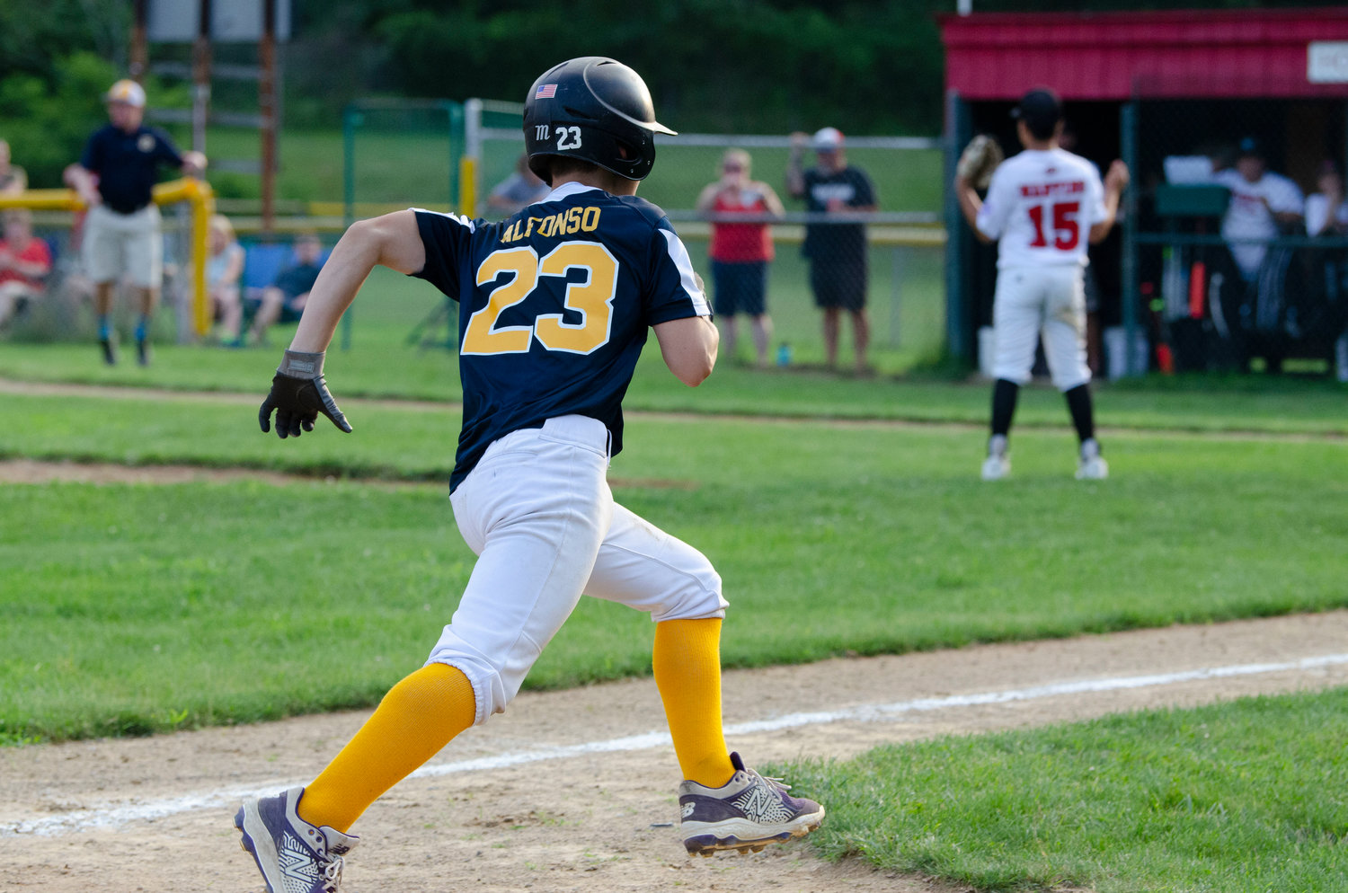 Barrington’s Henry Alfonso rounds third base and heads for home during the sixth inning of the first game of the District 2 finals against Riverside. Alfonso scored, giving Barrington all the runs they would need in the 2-0 victory.
