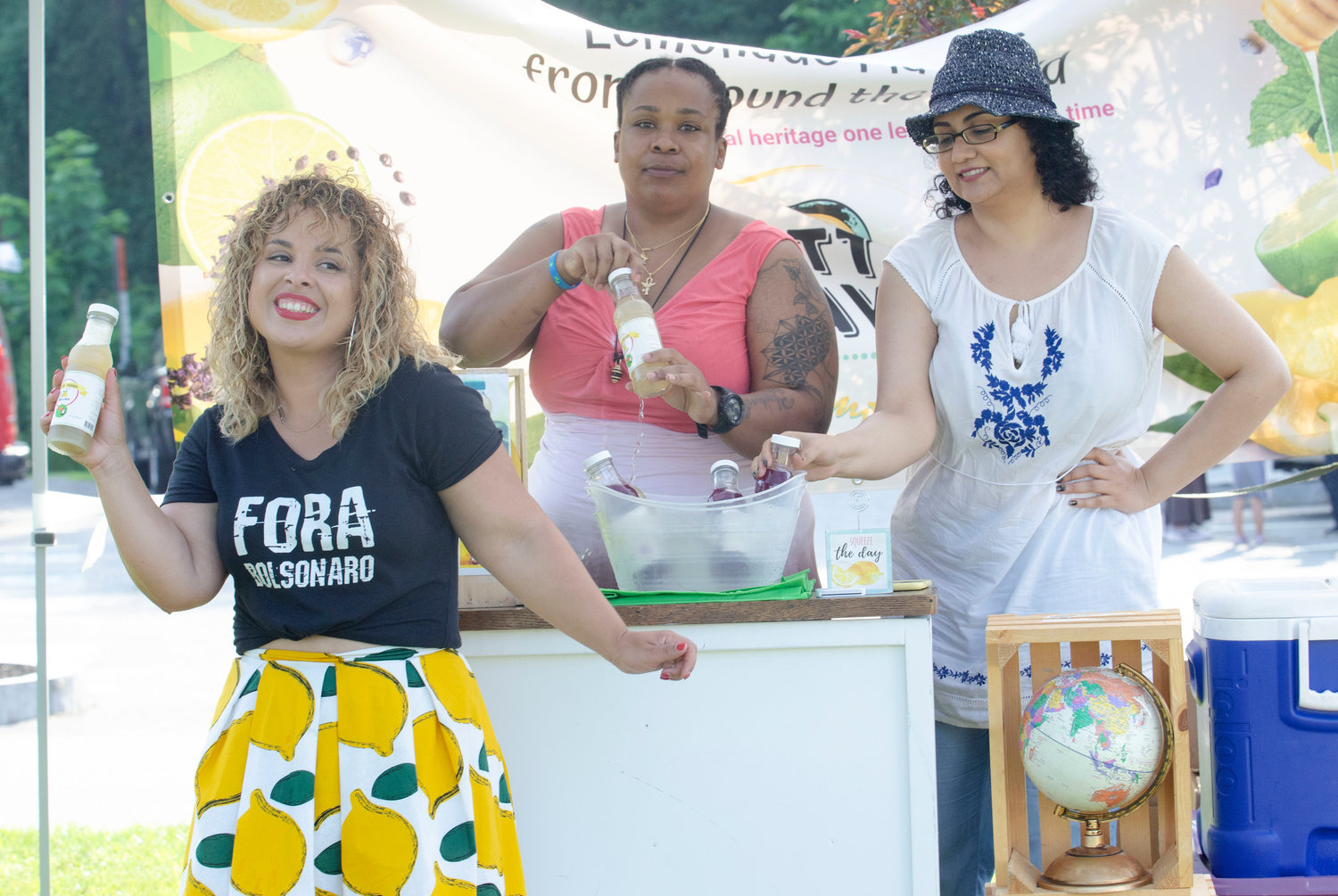 Organizer Mariana Silva-Buck enjoys a moment at the first of her "block parties" in Barrington last week.