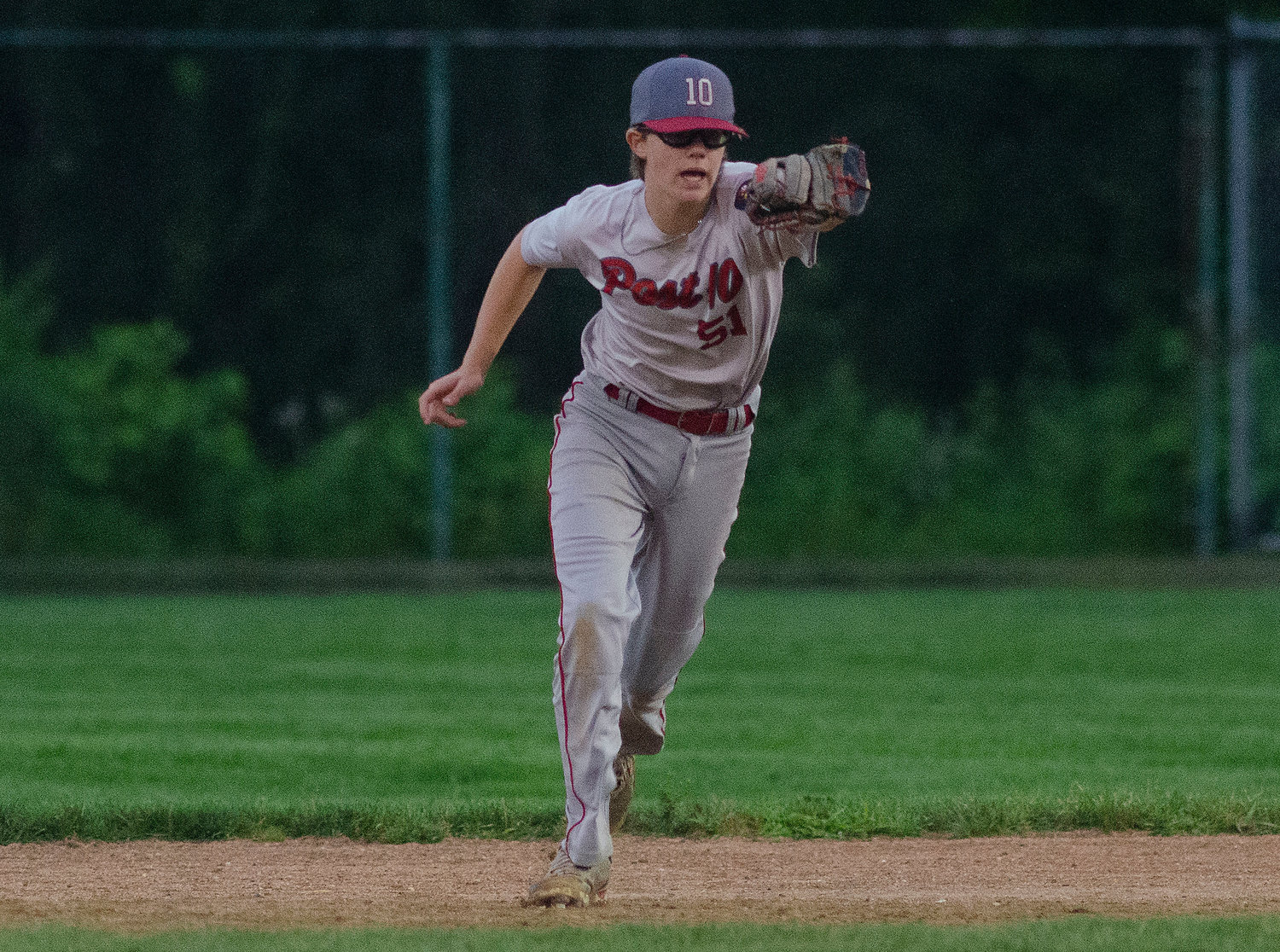 Brian Rutkowski, making a play in the team's final regular season game last week, was the offensive standout for the Post 10 Juniors in their playoff opening win August 2.