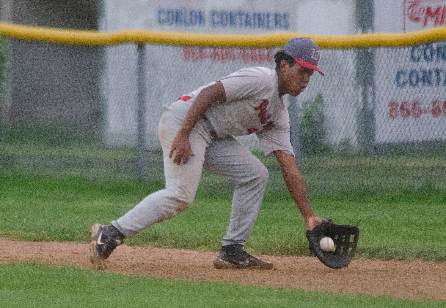 Post 10 first baseman Zumel Vargas snares a grounder up the first base line Thursday night, July 29.