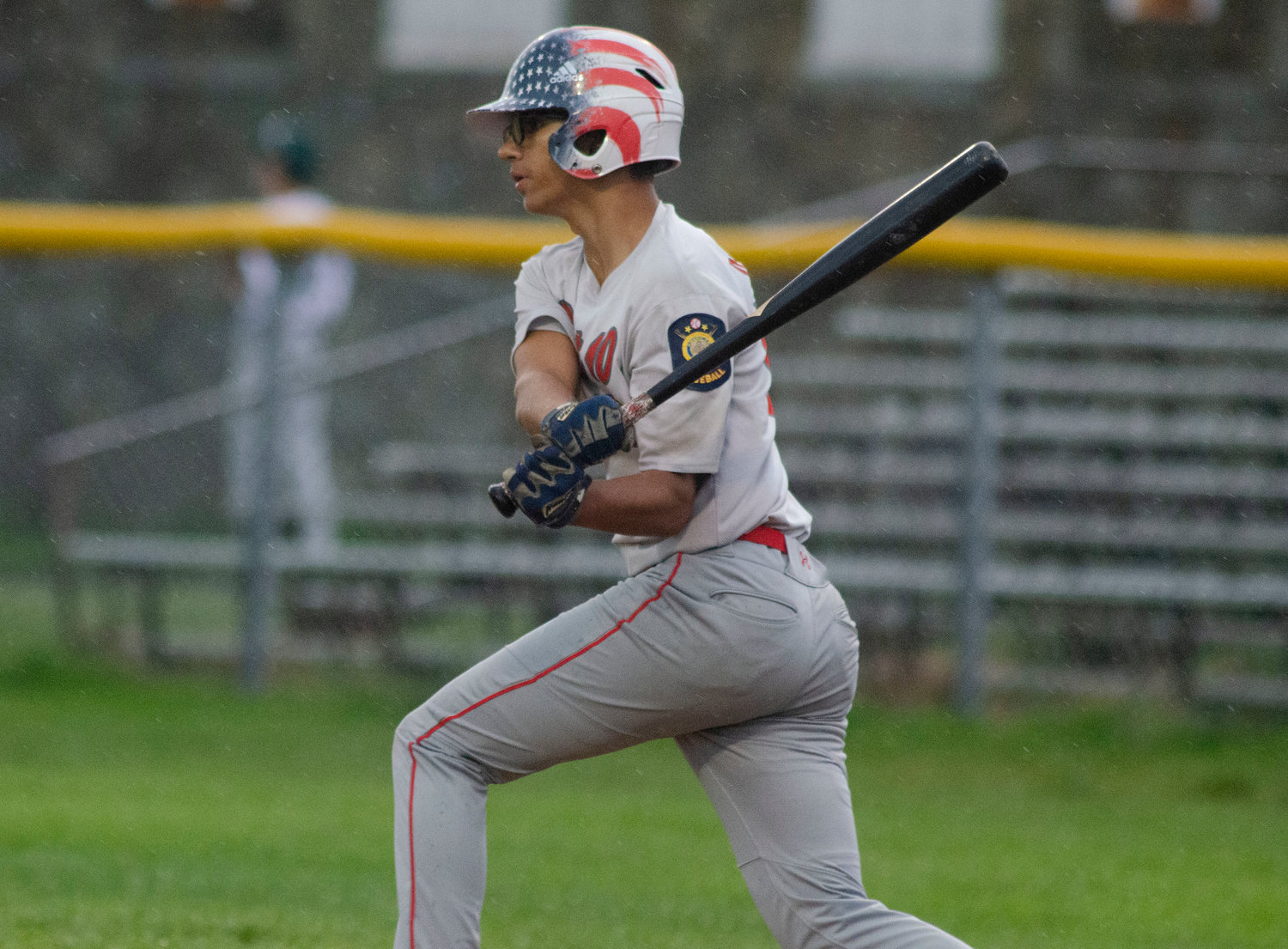 Post 10’s Jarod Vieira smacks a hit during the game Thursday night, July 29.