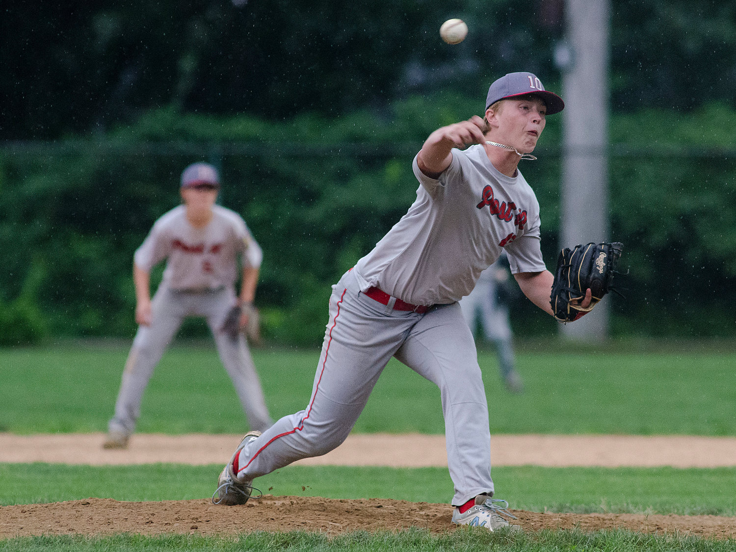 Aidan Greene throws a pitch for the Riverside Post 10 Junior Legion baseball team during its game against Scituate on Thursday night, July 29.