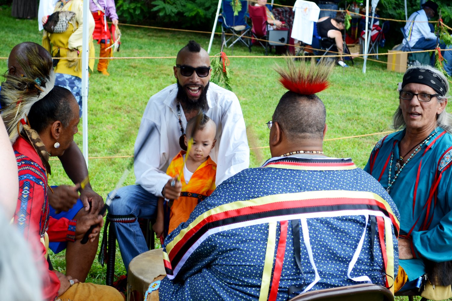Raymond Two Hawks Watson and his son, Asher Bear Paw Watson, from the Mashapaug Nahaganset Tribe, treated the gathered public to traditional Pokanoket drumming and singing during the welcoming ceremony.