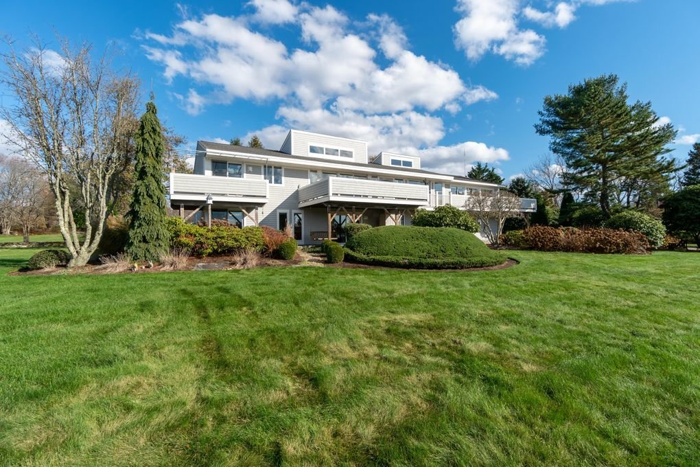 This contemporary home on Sachem Road in South Tiverton is another perfect example of the new market. With an enormous, modern kitchen, lots of space (more than 4,000 square feet) and multiple decks designed to take advantage of Sakonnet River views, it makes a great family home. A few years ago it might have sold for $700,000. But times are changing. Though in 2020 it was assessed at $692,400, this year Tiverton increased its assessment to $968,700. In 2012, it sold for $632,500. Earlier this year it sold for $1.4 million.

Sellers were represented by Liz Kinnane of Mott & Chace Sotheby’s, and the Buyers were represented by Cherry Arnold of Mott & Chace Sotheby’s.
