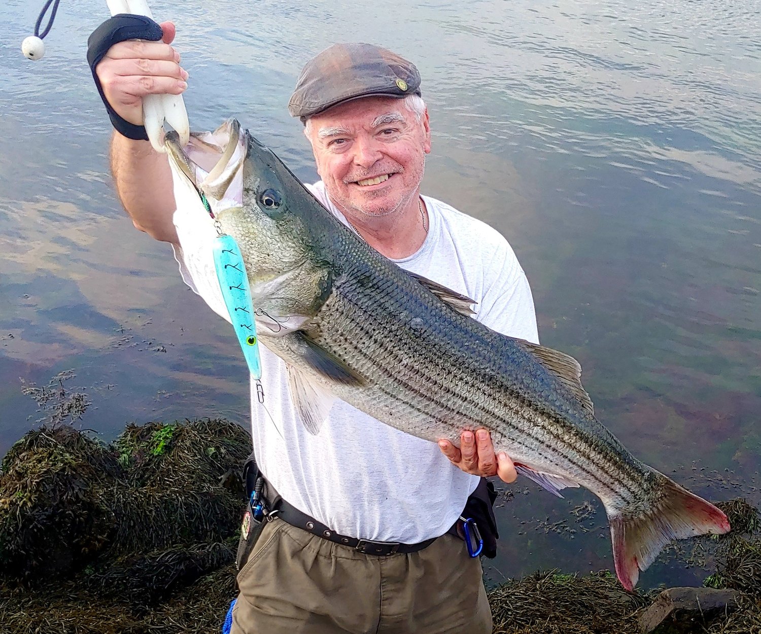 East End Eddie Doherty with the 21 pound striped bass he caught this week on the Cape Cod Canal.