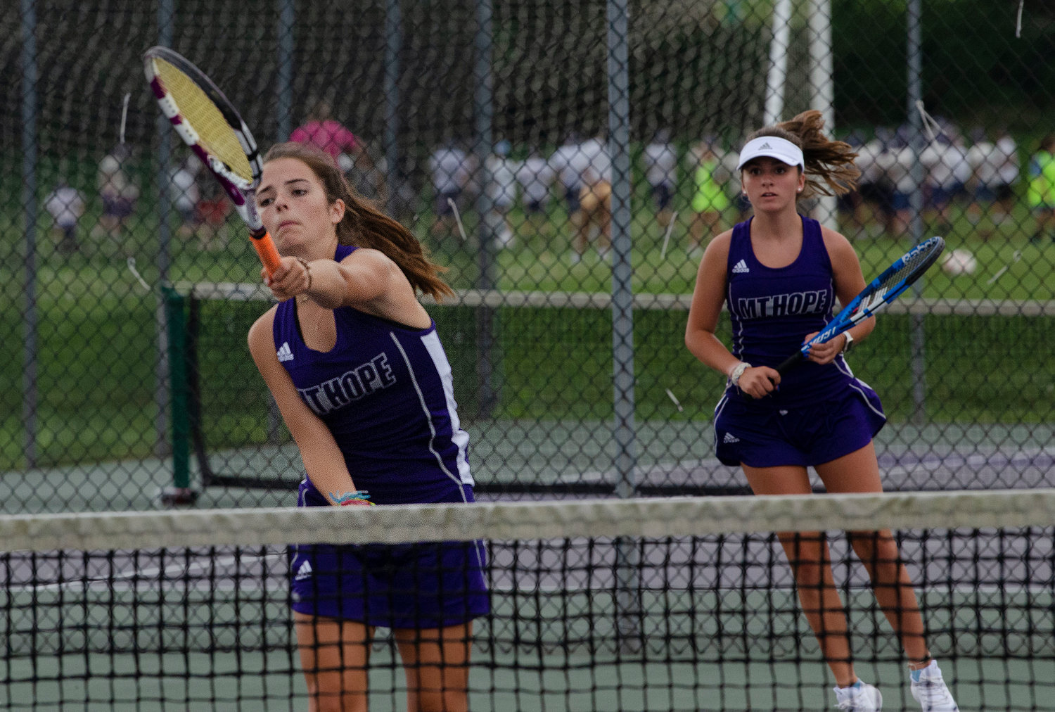 Second doubles players, Zelda Hayes (left) and Lacey Dufficy play a point during their match on Wednesday.