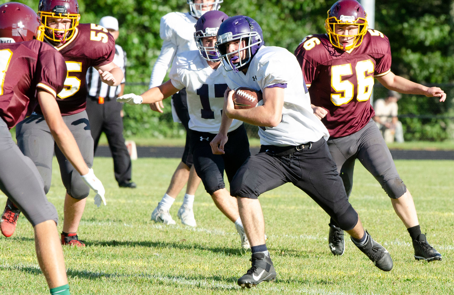 Mt. Hope senior running back Hunter Kavanagh heads up field for a gain in the first quarter.
