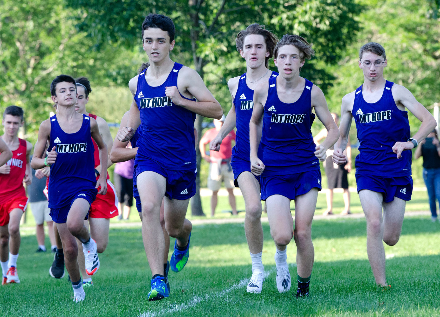 Jacob Detres, Sam Merriam, George Piper, Owen Schenk and Declan Reed race up field during the start of their cross country dual, home meet at Bristol Town Beach on Monday 9/13.