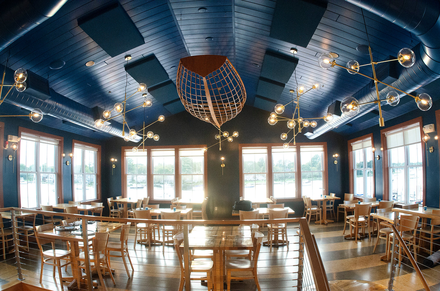 The new upstairs dining area features a warm color palette and lots of handcrafted wood accents.