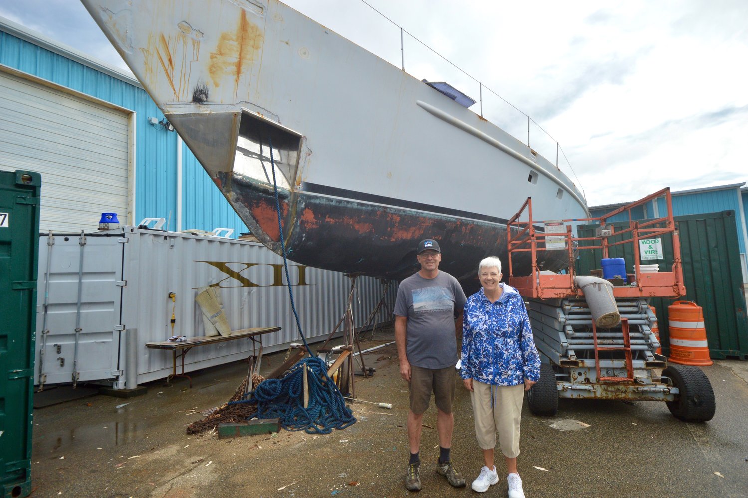 Standing in front of Pacific Star at the Hinckley Boat Yard last week are its owner, Ty Fields, and Capt. Ann Ford of Youth With a Mission (YWAM).