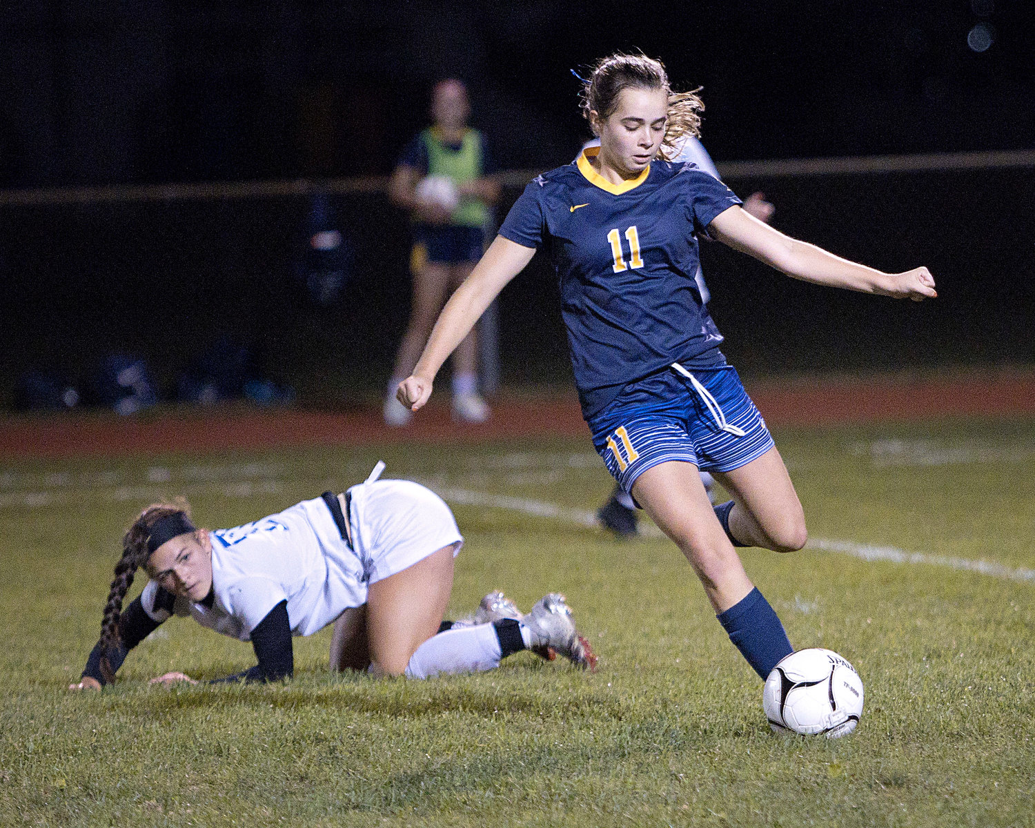 Ella Abadi sends a pass across mid-field during Friday's game against Cumberland.