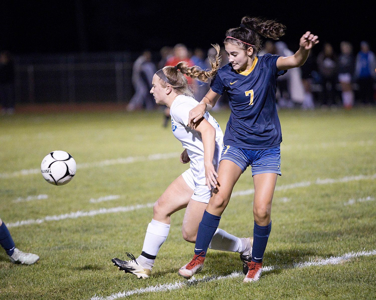 Hannah Carlotto pressures a Cumberland opponent.