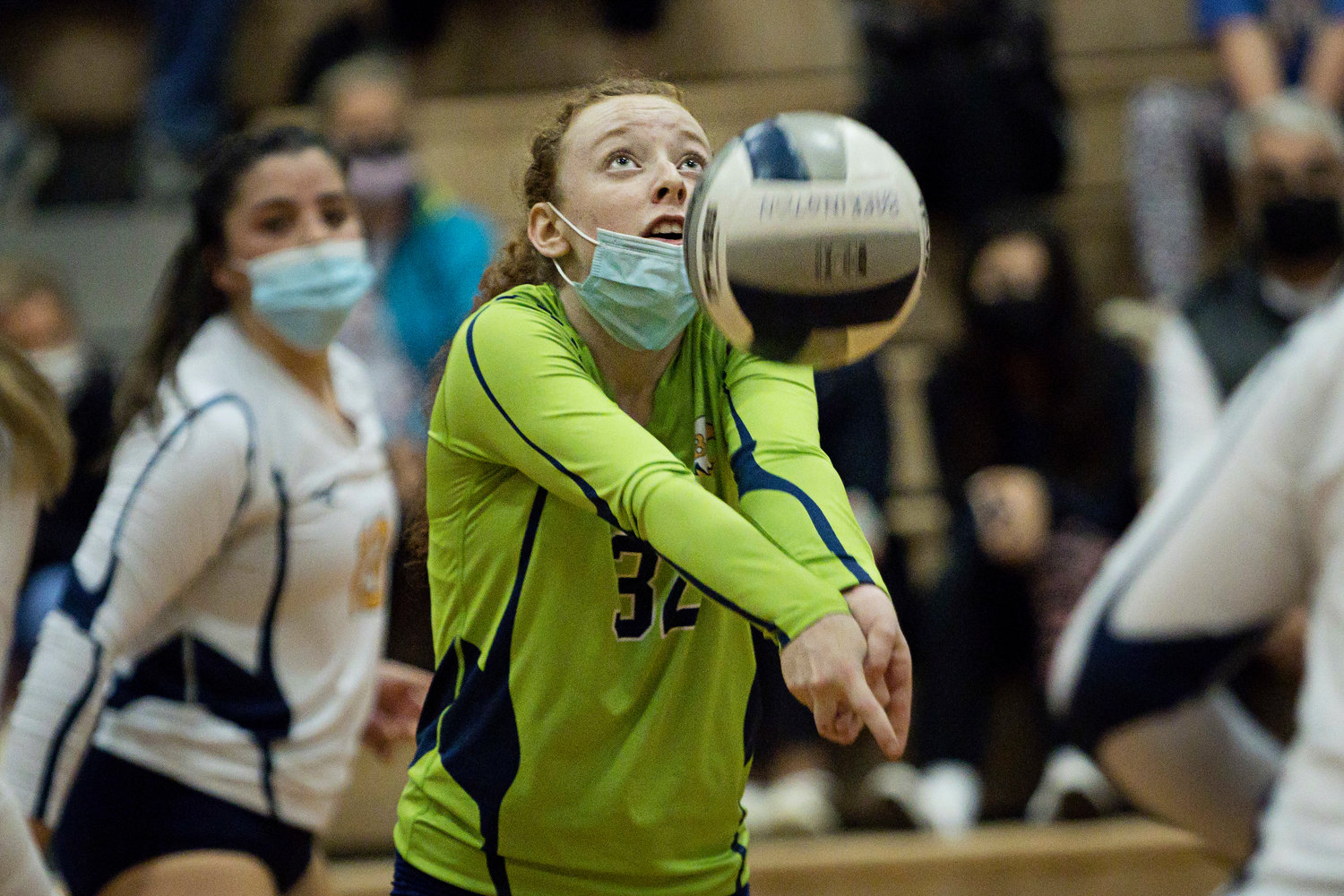 Morgan Martin bumps the ball up for a teammate while rallying with 
Rogers, Monday night.