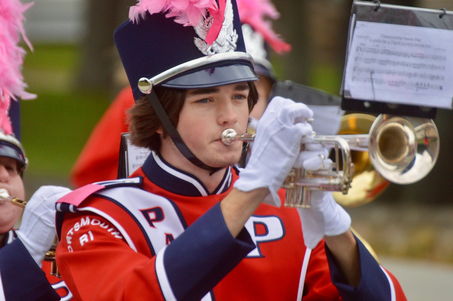 Garrett Kemper performs a tune with the PHS Marching Band during the Homecoming parade.