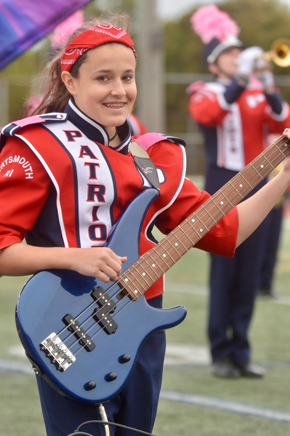 Anabella Barber plays electric bass as she accompanies the PHS Marching Band, which played well-known rock and roll songs from the ’80s and ’90s.