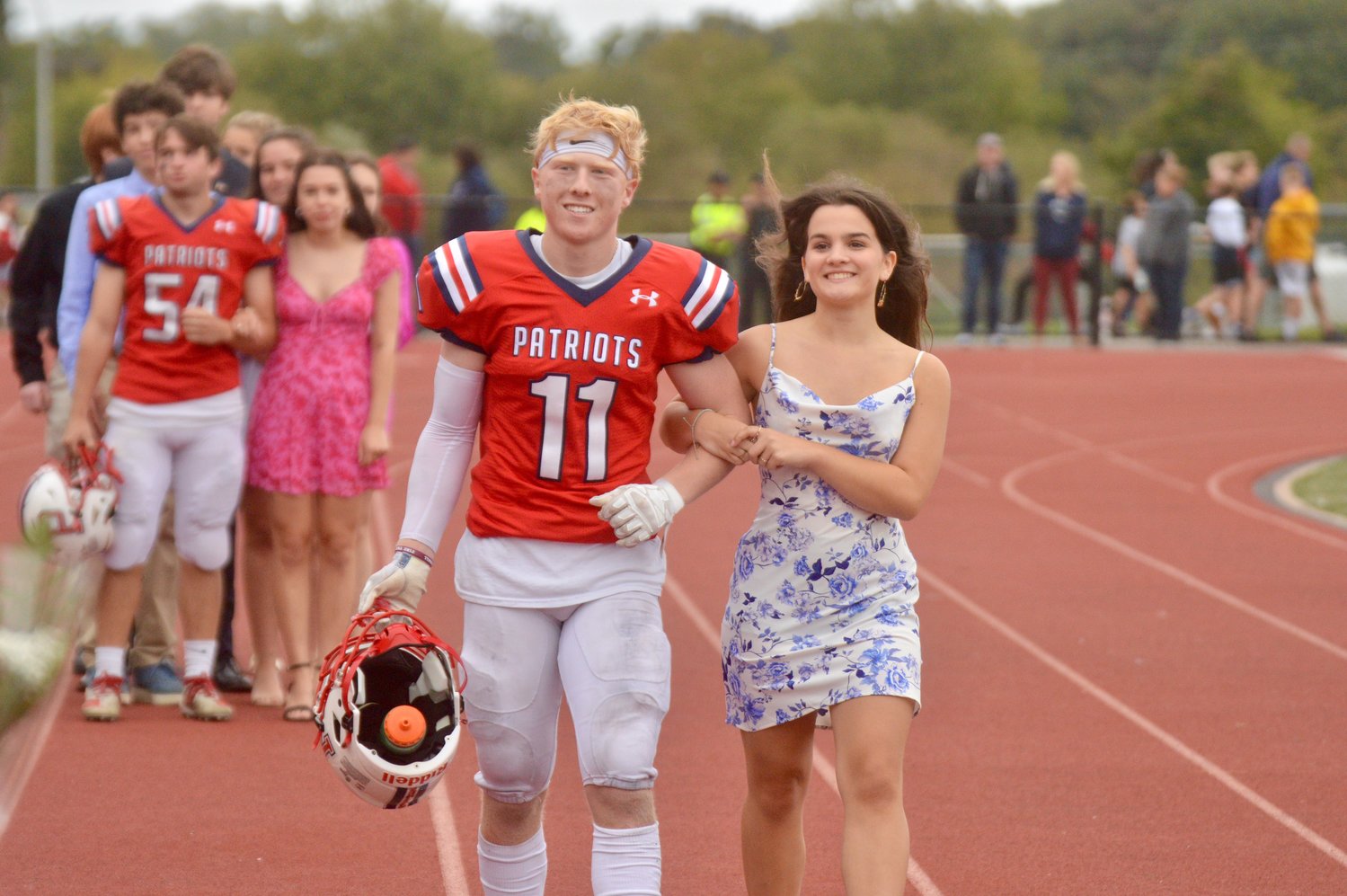 Gavin Bicho and Ruth McKinnon of the Homecoming court are introduced at halftime.