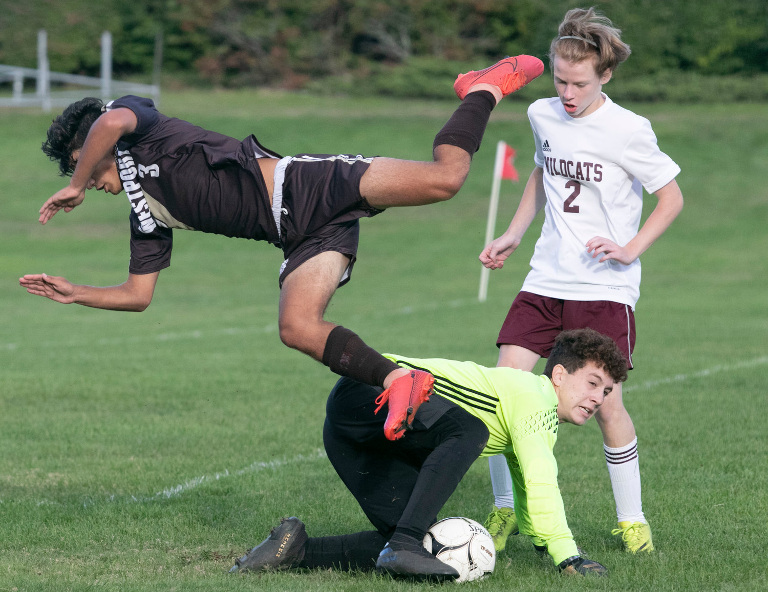 Midfielder, Antonio Dutra-Africano is upended by the West Bridgewater goalkeeper as he attempts to score in the second half.