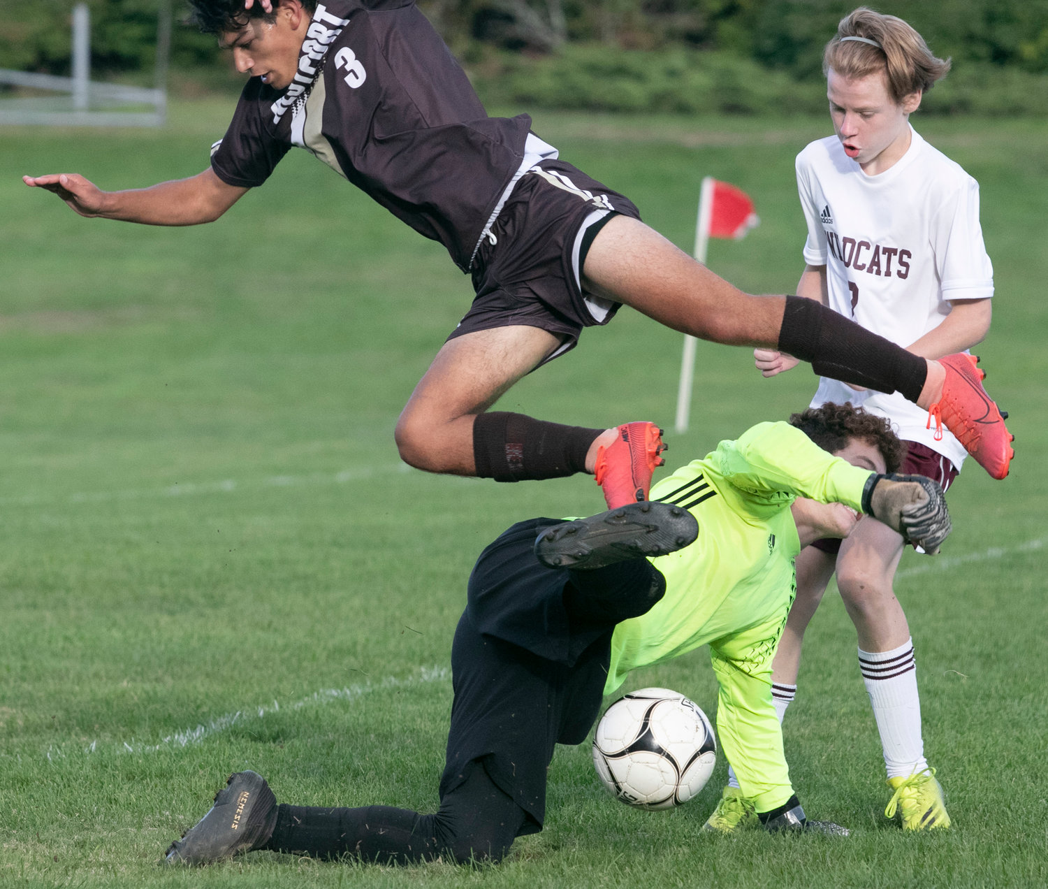 Midfielder, Antonio Dutra-Africano is upended by the West Bridgewater goalkeeper as he attempts to score in the second half.