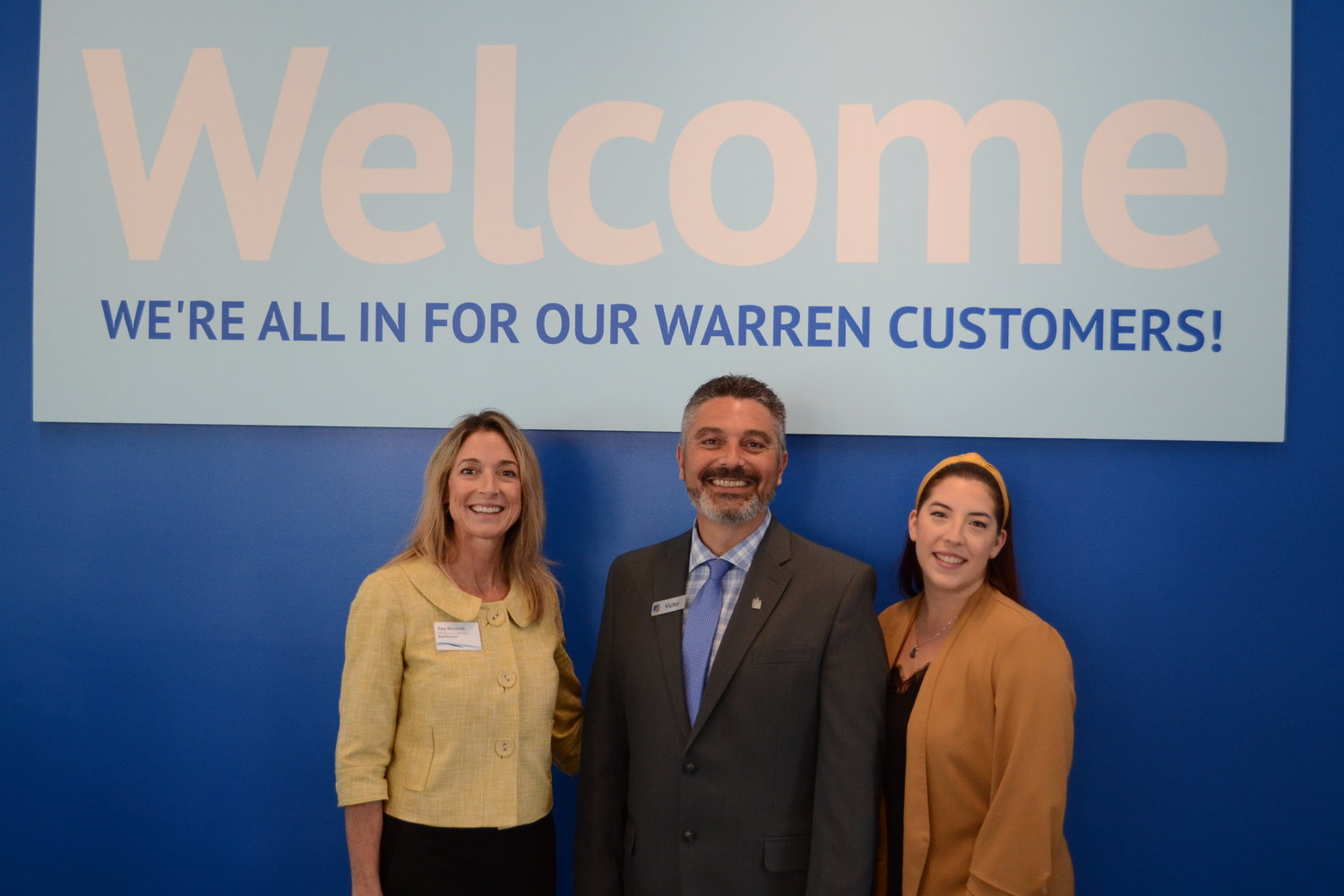 Amy Riccitelli, Director of Retail Sales, Victor Correia, and Rhiannon Phillips, universal banker for BankNewport, welcomed locals into the revamped branch on Friday morning.