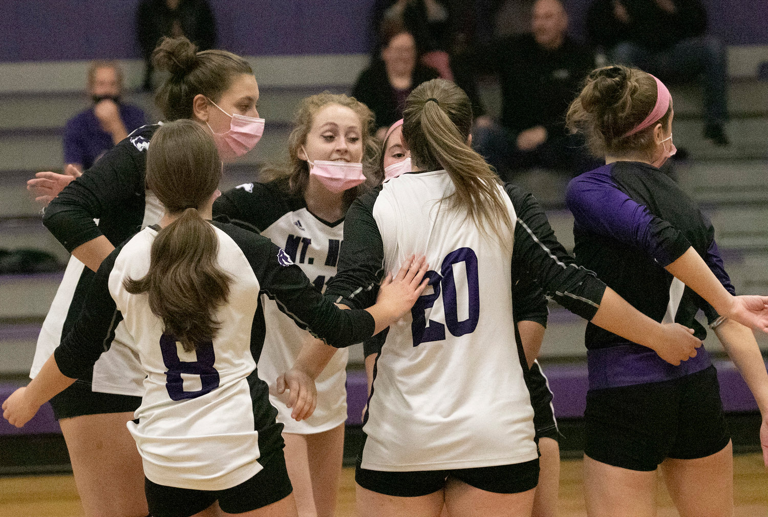 Emma Torres (left), Abby Adams, Jillian Brown, Sammy Malafronte, Grace Stephenson and Erika Tally, rally after a Huskies point. 