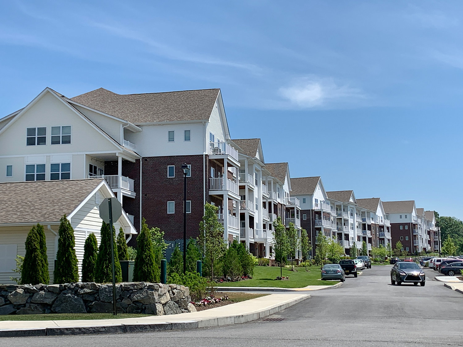 A view looking at a row of apartment buildings inside the Kettle Point development.