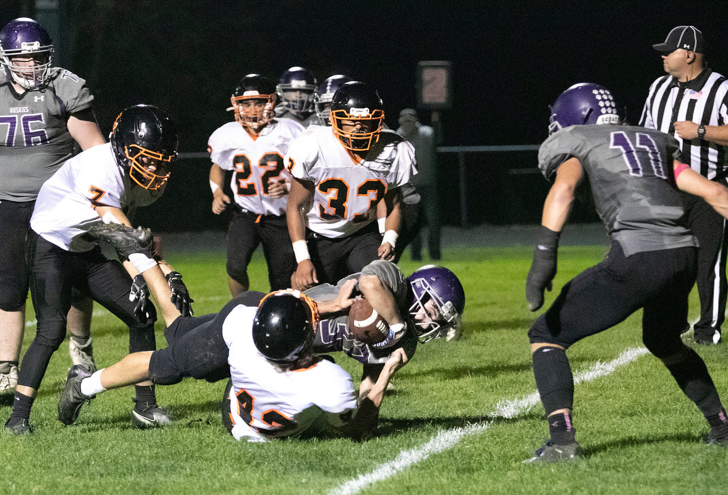 Brock Pacheco lunges for the end zone in the first quarter. The play was called back due to a Huskies penalty. Pacheco scored on a 24 yard run, on the very next play to cut the Wizard’s lead to 7-6.