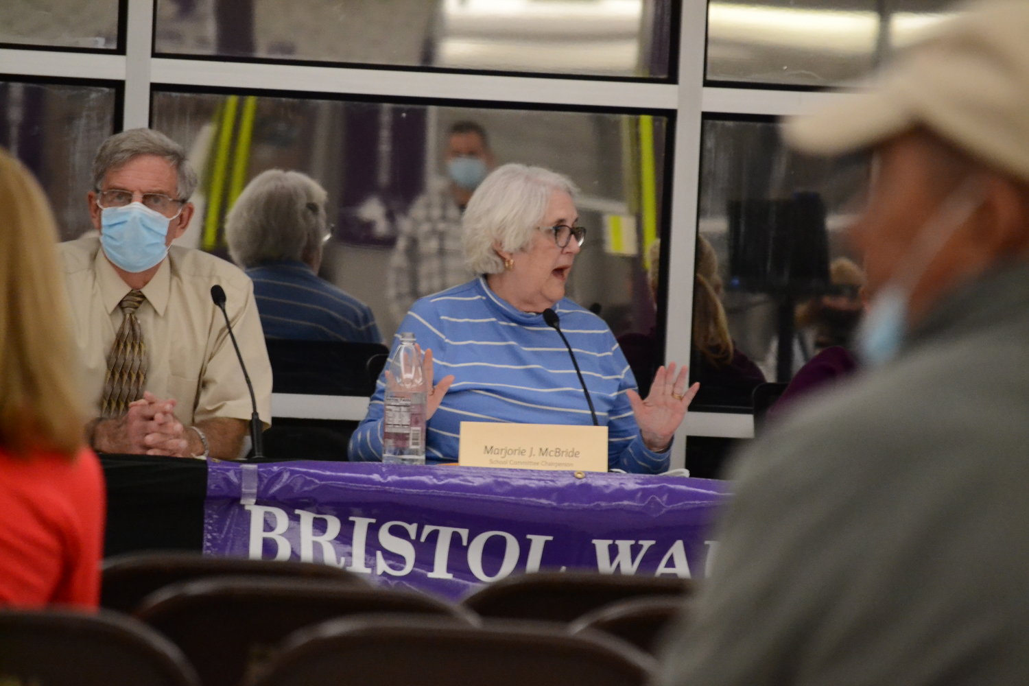 School Committee Chairperson Marjorie McBride shouts for order in the room after questioning of the proposed vendor for professional development in the district descended into chaos Monday night. She would vote to deny the $7,000 expenditure shortly after.