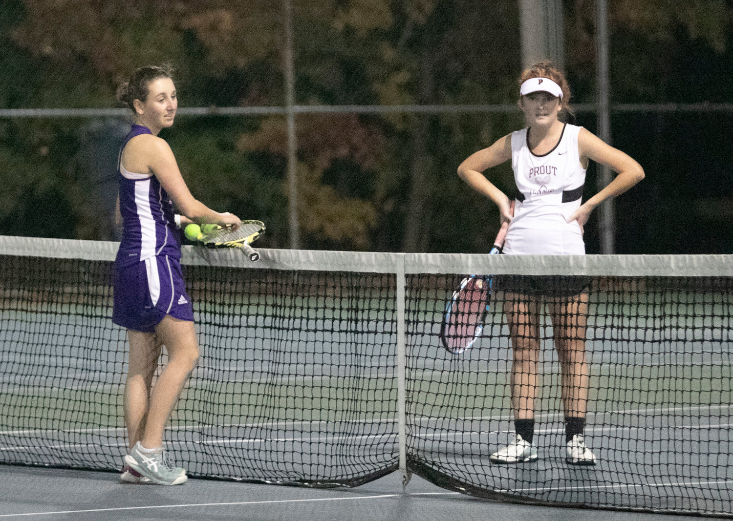 Huskies third singles player sophomore Cate Merriam plays in a tie breaker for the match against Prout's Breck O’Connor.