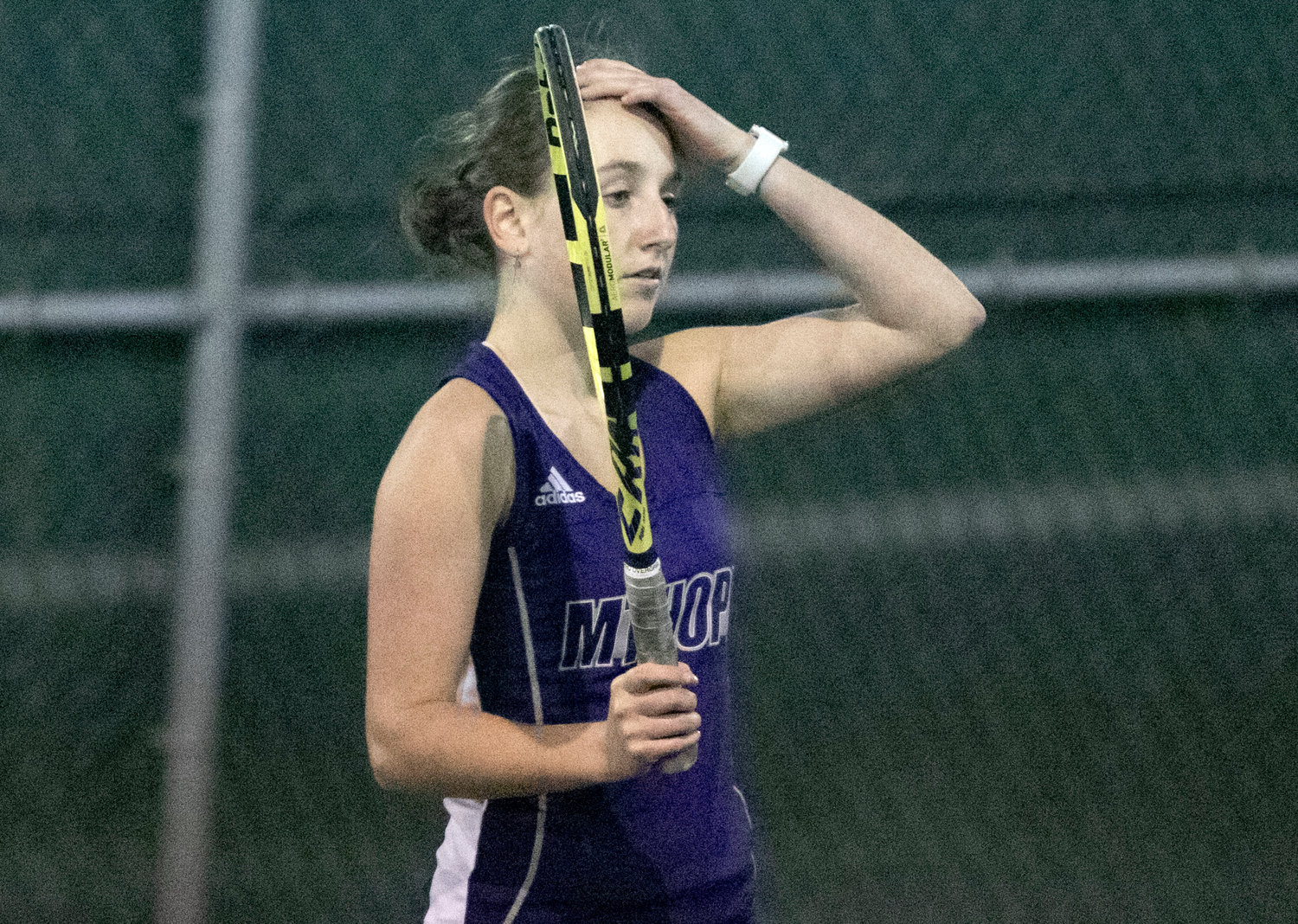 Huskies third singles player sophomore Cate Merriam plays in a tie breaker for the match against Prout's Breck O’Connor.