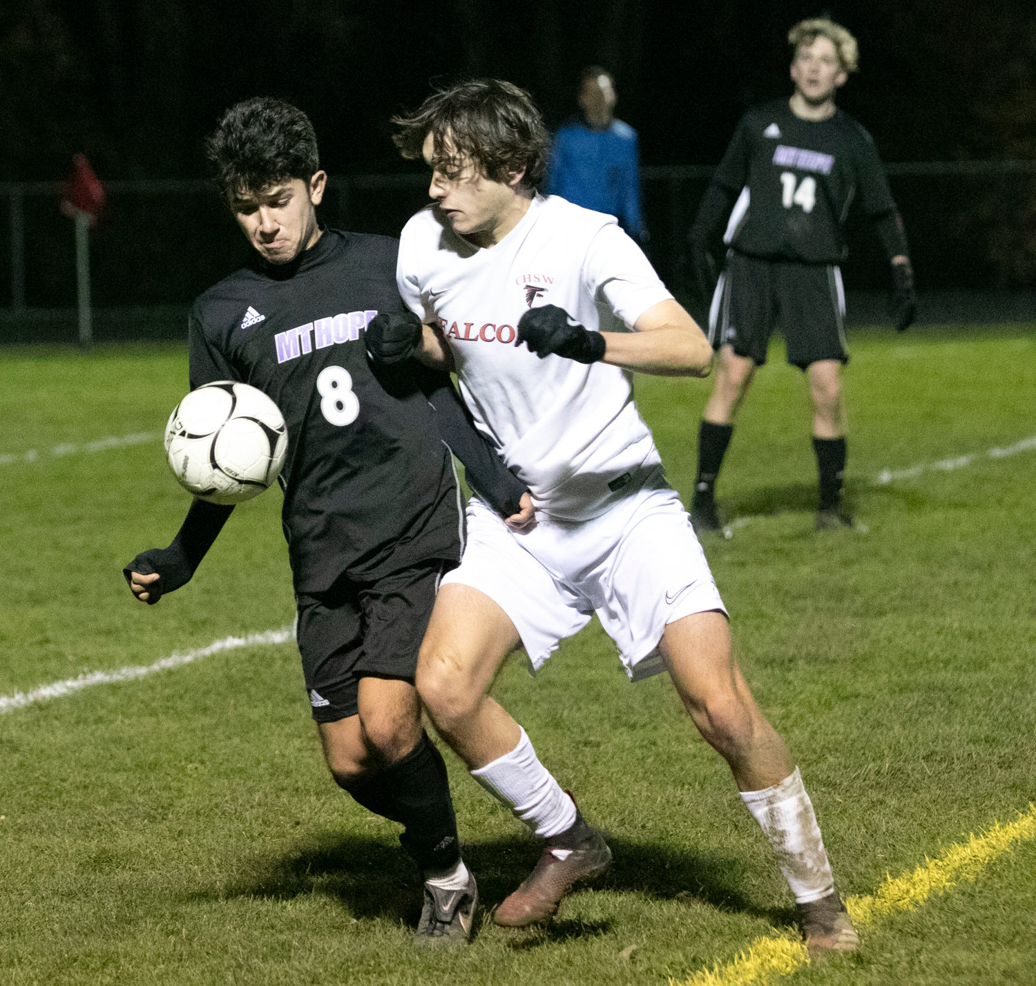 Chad Parente collects a pass and dribbles up field.