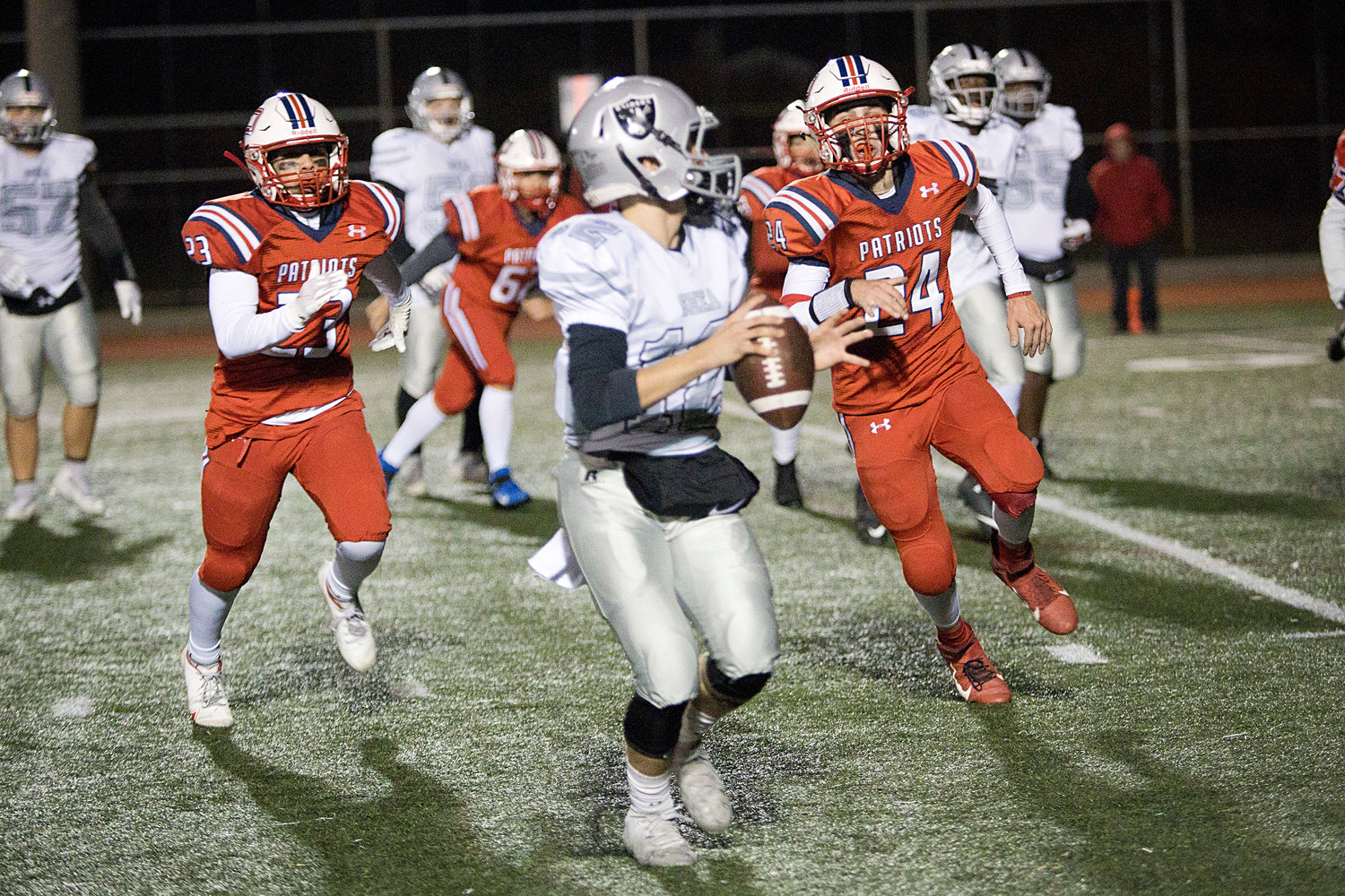 Portsmouth’s Sage Qaisar (left) and Dylan Brandariz close in on a Shea ball-carrier.
