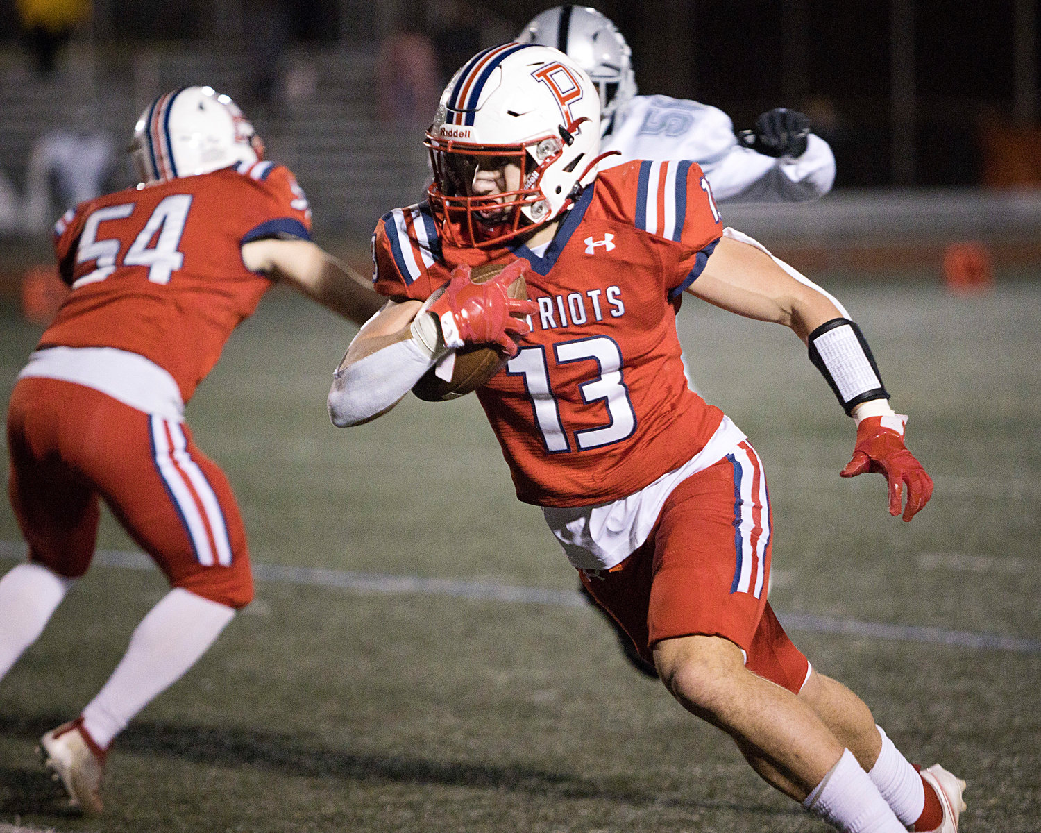 Portsmouth’s Evan Beese runs the ball wide to score a touchdown for the Patriots against Shea.