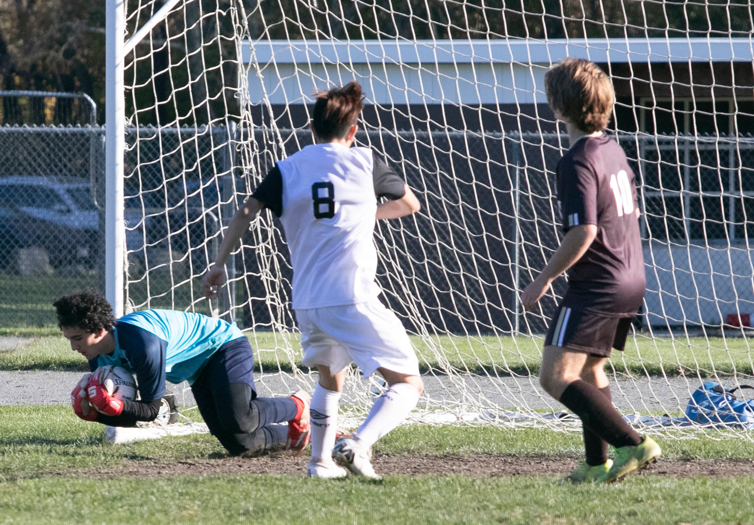 Goalkeeper Noah Amaral makes one of just four saves during the game as the Westport team defense stymied the Taconic attack.