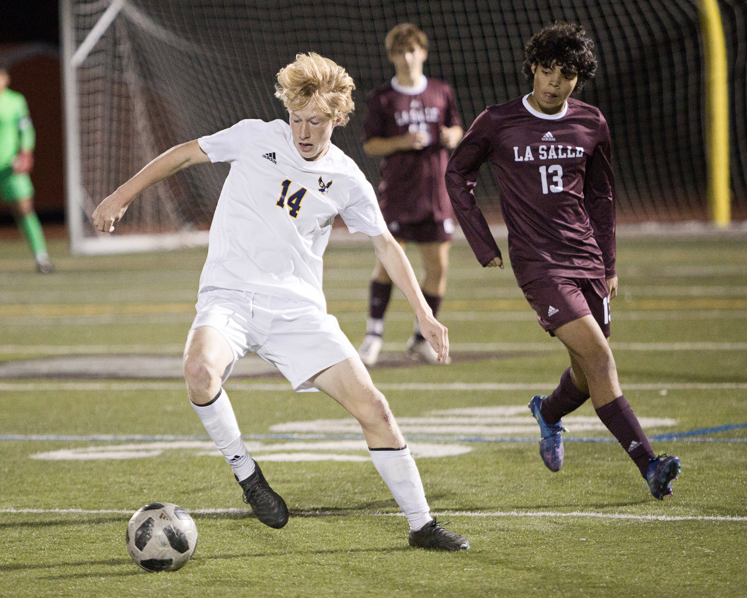 Leo Caldarella turns the ball toward the net while competing against LaSalle in the Division I semifinals, Wednesday.