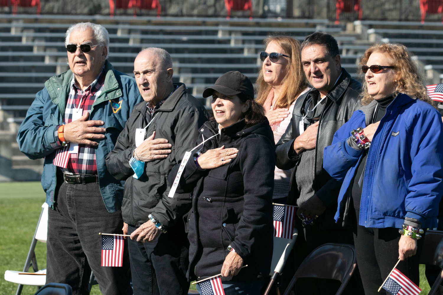 Edward Silva, Frank G. Silva Jr., Janice Abatiello, (front row, left to right) Martha Brown, Lucas Silva and Jean Saylor (back row, left to right) attend the East Providence Veterans Expressway rededication ceremony in honor of their late uncle Corporal Manuel Gonsalves Silva, WWII, Army. Cpl. Silva died at the Battle of Saint-Lô in France in July 1944. Bridge No. 4 over Interstate 195 is named in his memory.