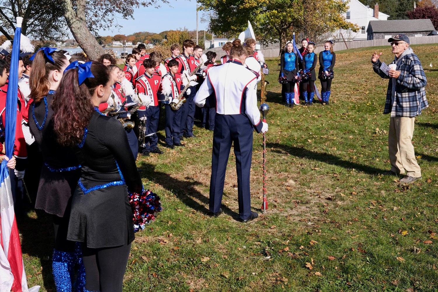 George Cushing (right) thanks PHS Band members after their performance.