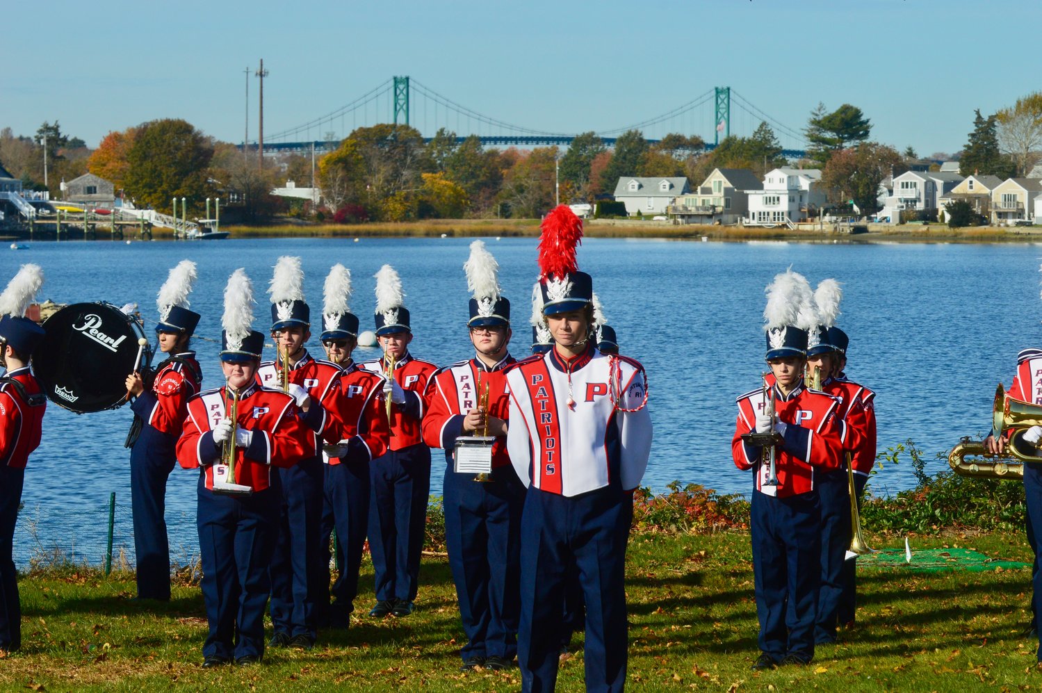 The PHS Marching Band performs on the back lawn of Thriving Tree Coffee House, overlooking Blue Bill Cove, in a tribute to veterans.
