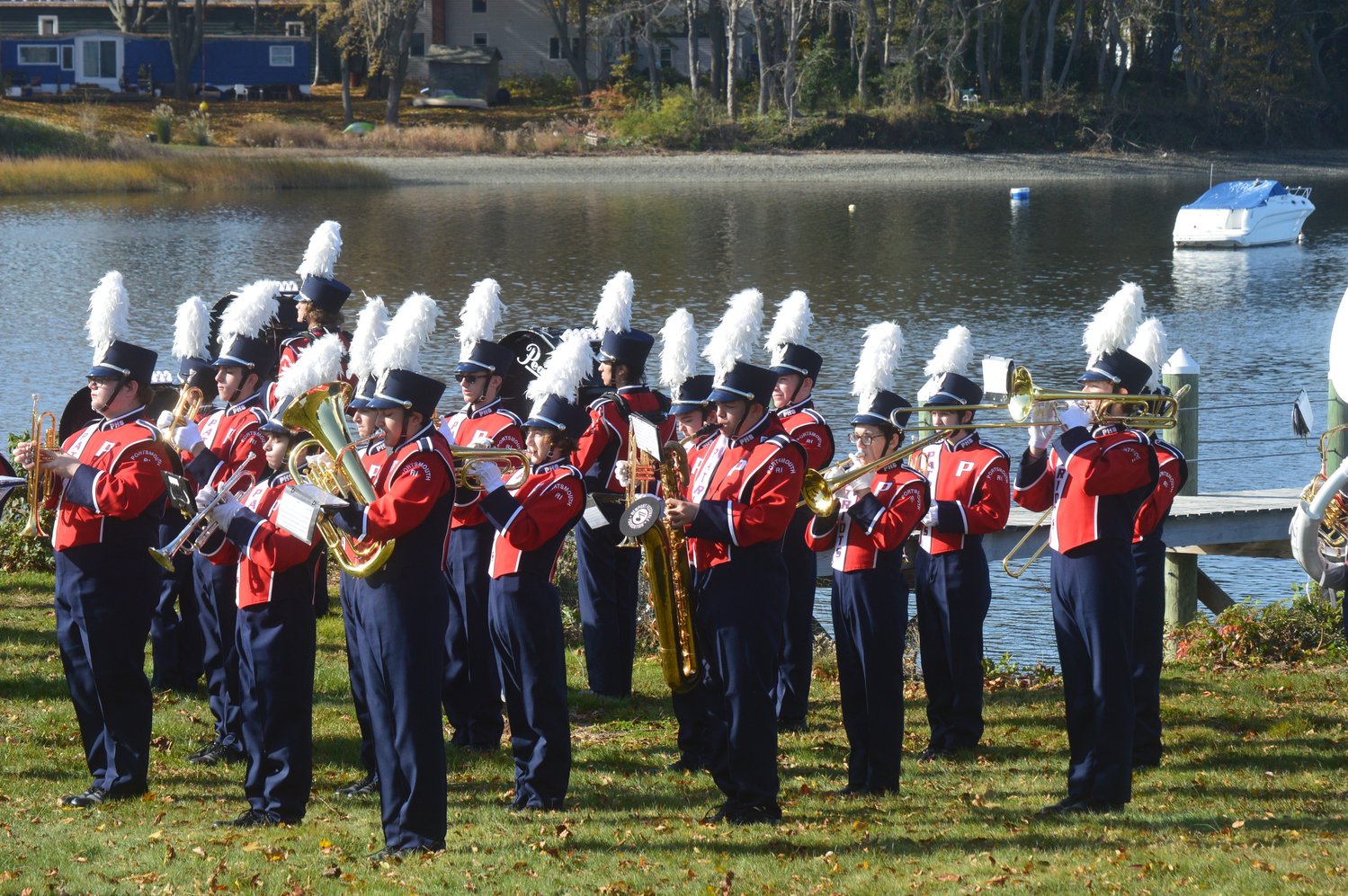 The PHS Marching Band performs on the back lawn of Thriving Tree Coffee House, overlooking Blue Bill Cove, in a tribute to veterans.