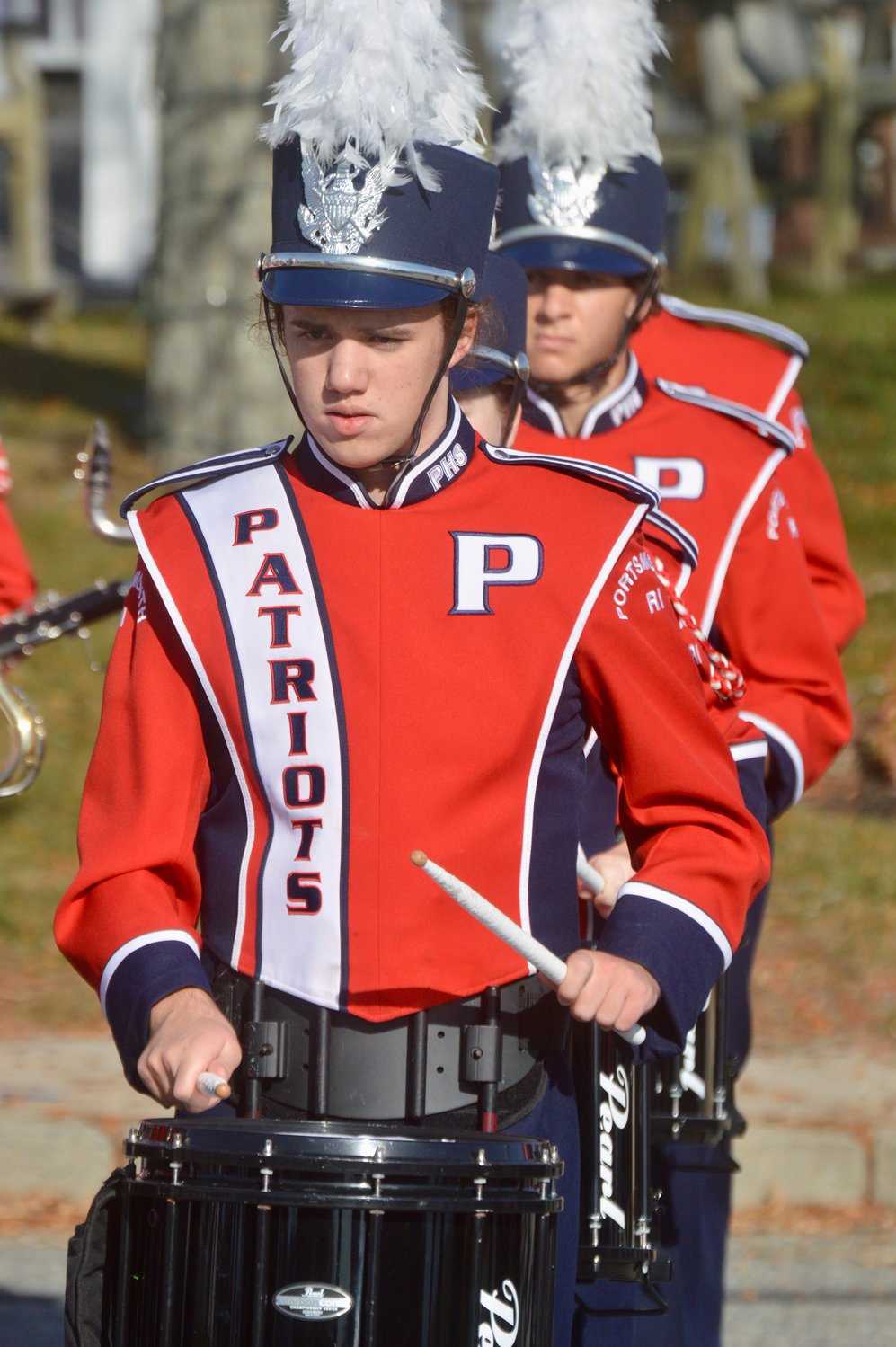 Members of the PHS Marching Band warm up near Stone Bridge before the short Veterans Day parade.