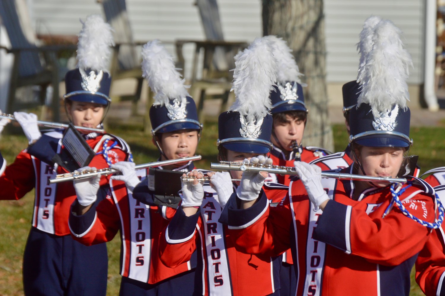 Members of the PHS Marching Band warm up near Stone Bridge before the short Veterans Day parade.
