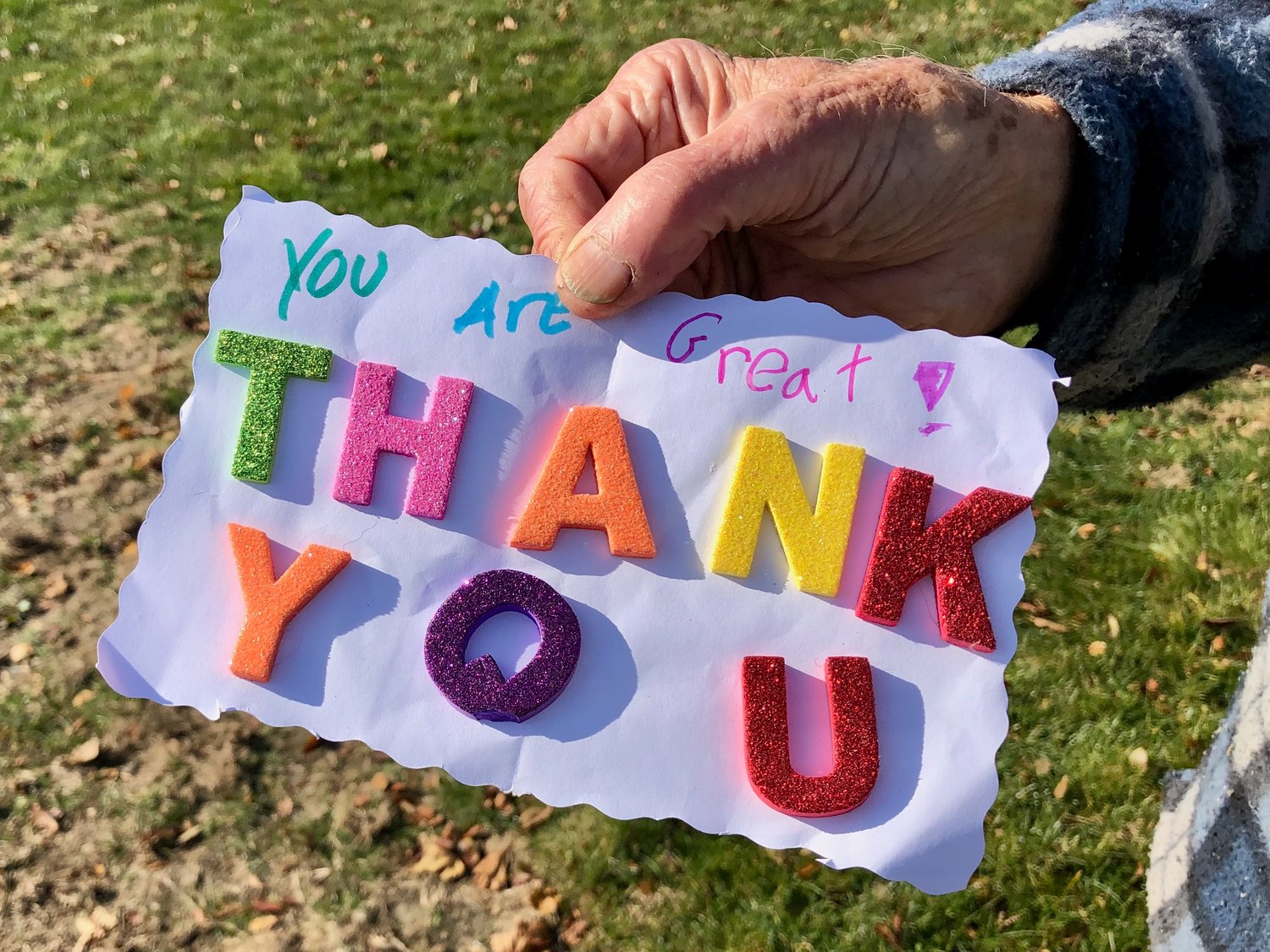 Army veteran George Cushman holds the handmade note a little girl handed to him at Thriving Tree. “I couldn’t buy this,” Cushman said. “I’ll never forget this — or her.”