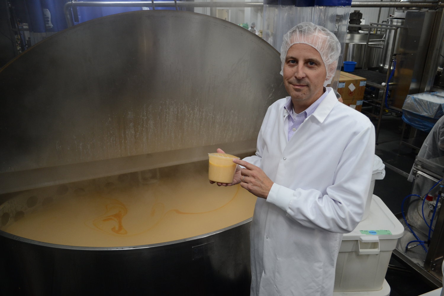 Todd Blount shows off a fresh batch of lobster bisque, one of the company’s top selling items, which is carried everywhere from small restaurants to supermarket giant Costco under their Kirkland brand.